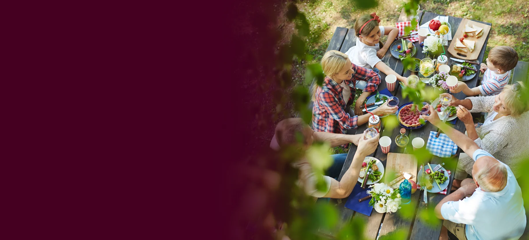 Family having lunch at a picnic table